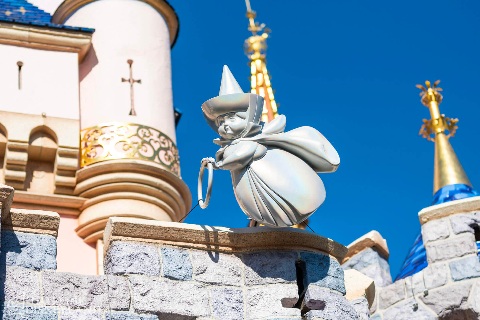 https://www.micechat.com/wp-content/uploads/2023/01/Disneyland-Disney100-Sleeping-Beauty-Castle-decorations-platinum-Three-Good-Fairies-Wishing-Star-DSC_1405-X5.jpg