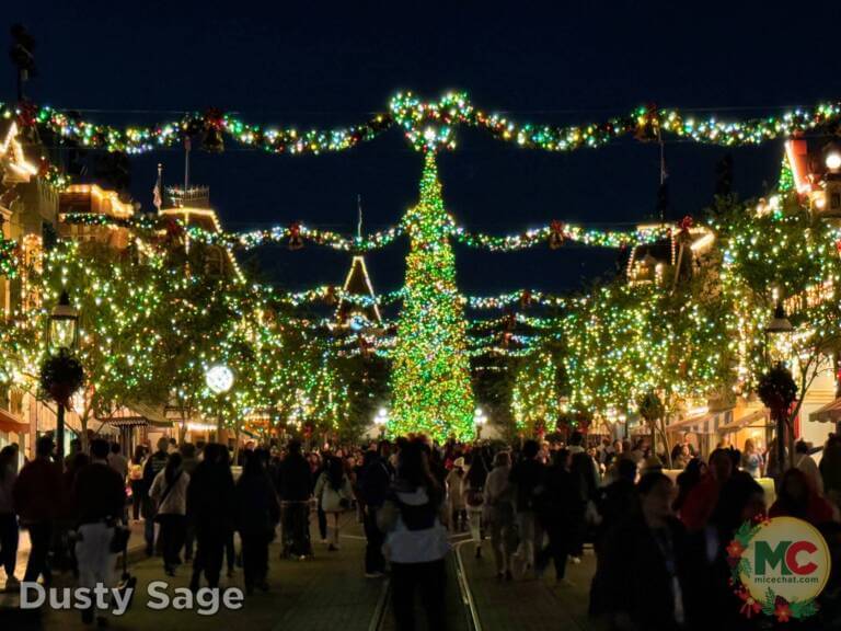 UPDATED Disneyland Events Pride Nite Details   Disneyland News Beauty Christmas Main Street Night Wide View Tree Garlands MiceChat 768x576 